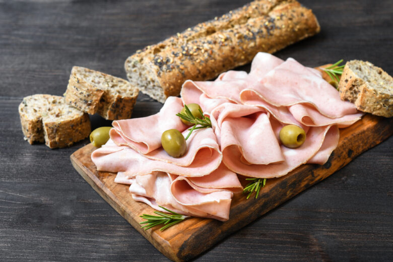 Traditional,Italian,Antipasti,Mortadella,On,A,Wooden,Plate,,Served,With