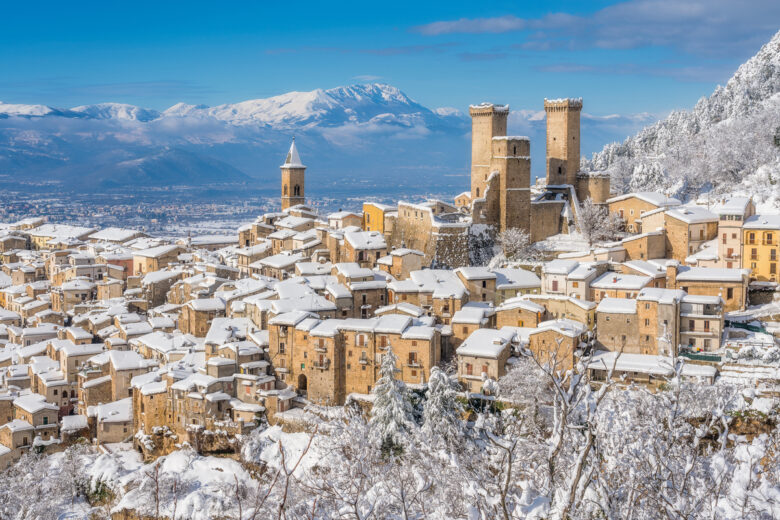 Panoramic,View,Of,Pacentro,Covered,In,Snow,During,Winter,Season.