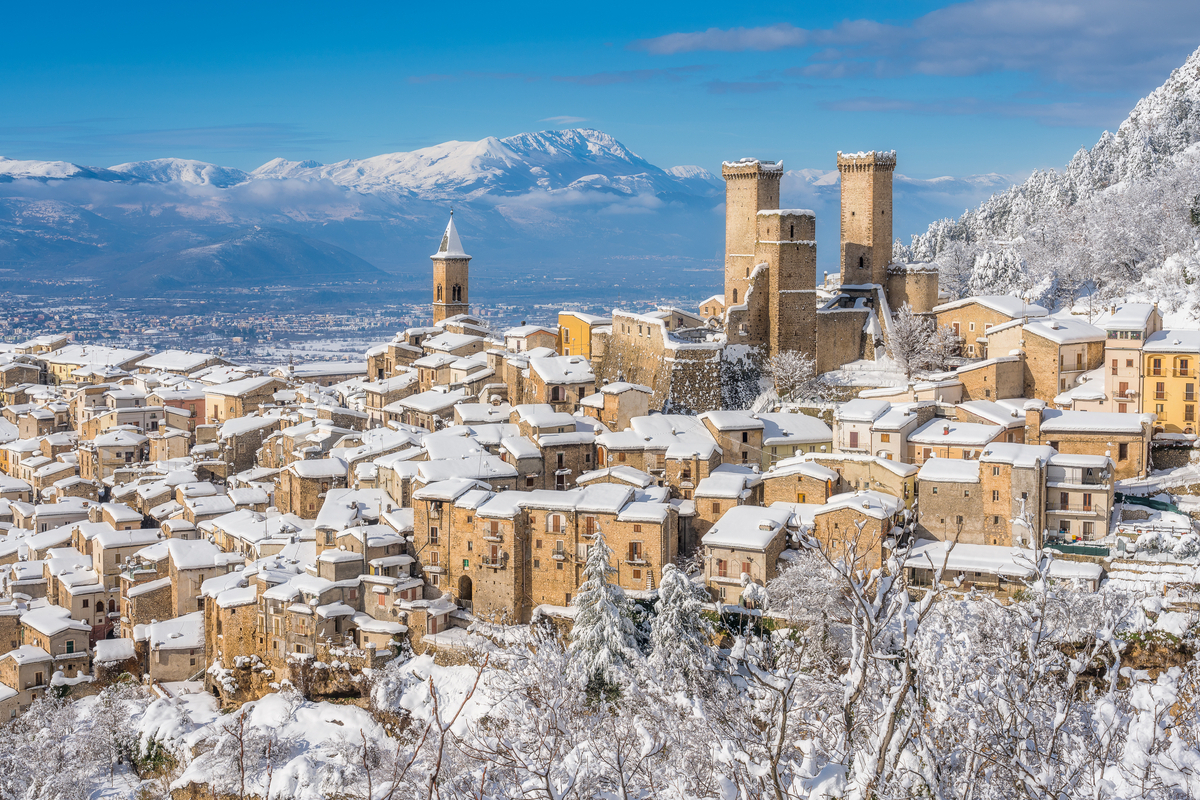 Panoramic,View,Of,Pacentro,Covered,In,Snow,During,Winter,Season.