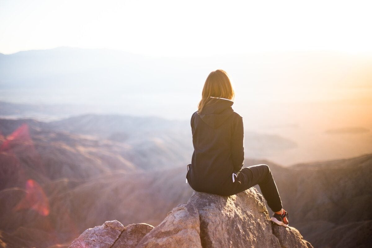 people, woman, travel, adventure, trek, mountain, rock, sunset, nature, cliff, black, hoodie, jacket, alone, thinking, freedom