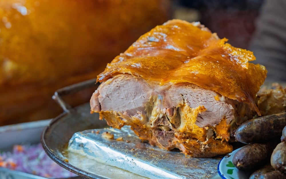 Close-up,Of,Traditional,Ecuadorian,Roasted,Pork,With,Crispy,Golden,Skin,