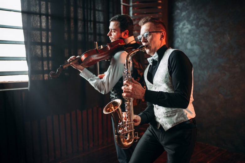 Sax,Man,And,Fiddler,Duet,Playing,Classical,Melody