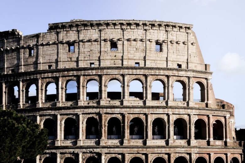 Stunning daylight view of the ancient Colosseum in Rome, Italy.