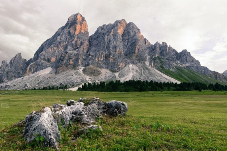 Majestic view of rugged Dolomites in summer evening light, perfect for travel inspiration.