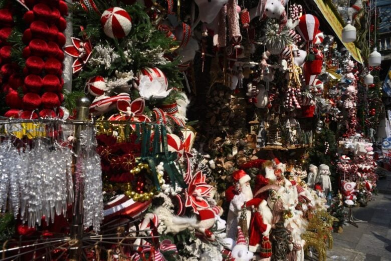Colorful Christmas market display with festive decorations and ornaments, perfect for holiday inspiration.